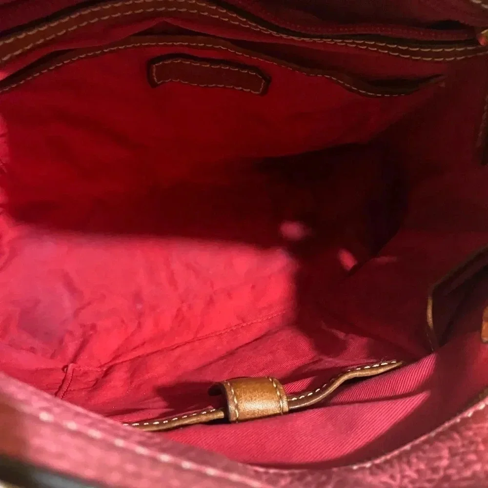 Dooney Bourke pink pebbled leather hobo handbag